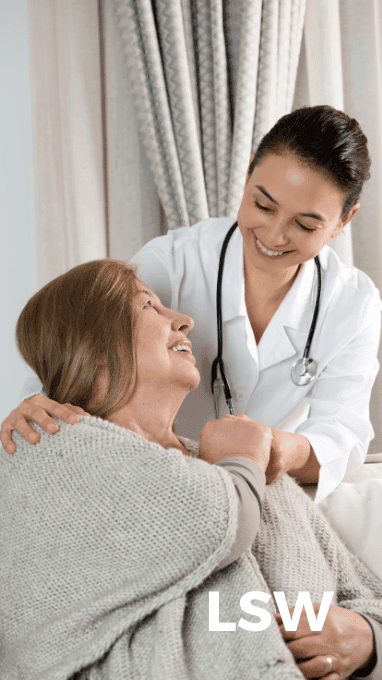 LSW Care Support Worker with Service User in a chair
