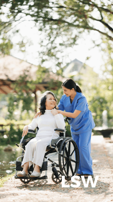 LSW Care Support Worker with Service User in a wheelchair